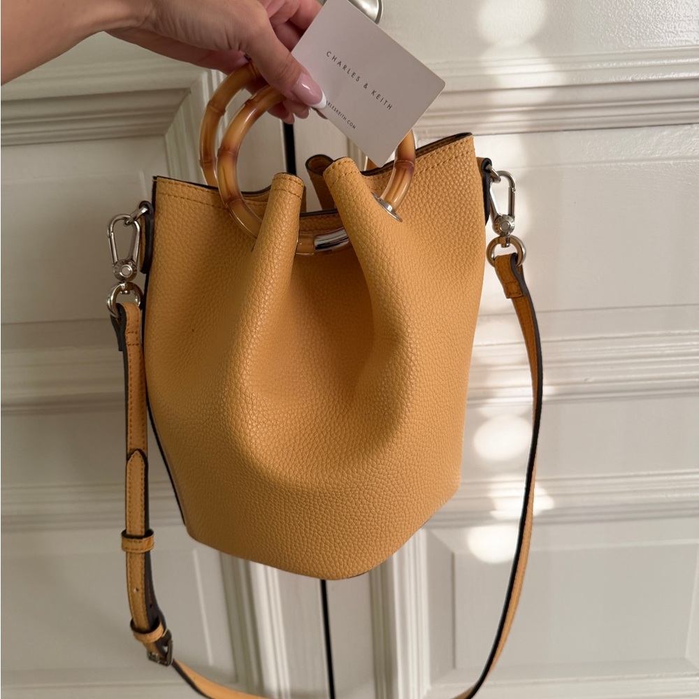 Charles & Keith Honey Yellow Pebbled Bucket Bag with Tortoiseshell Handles